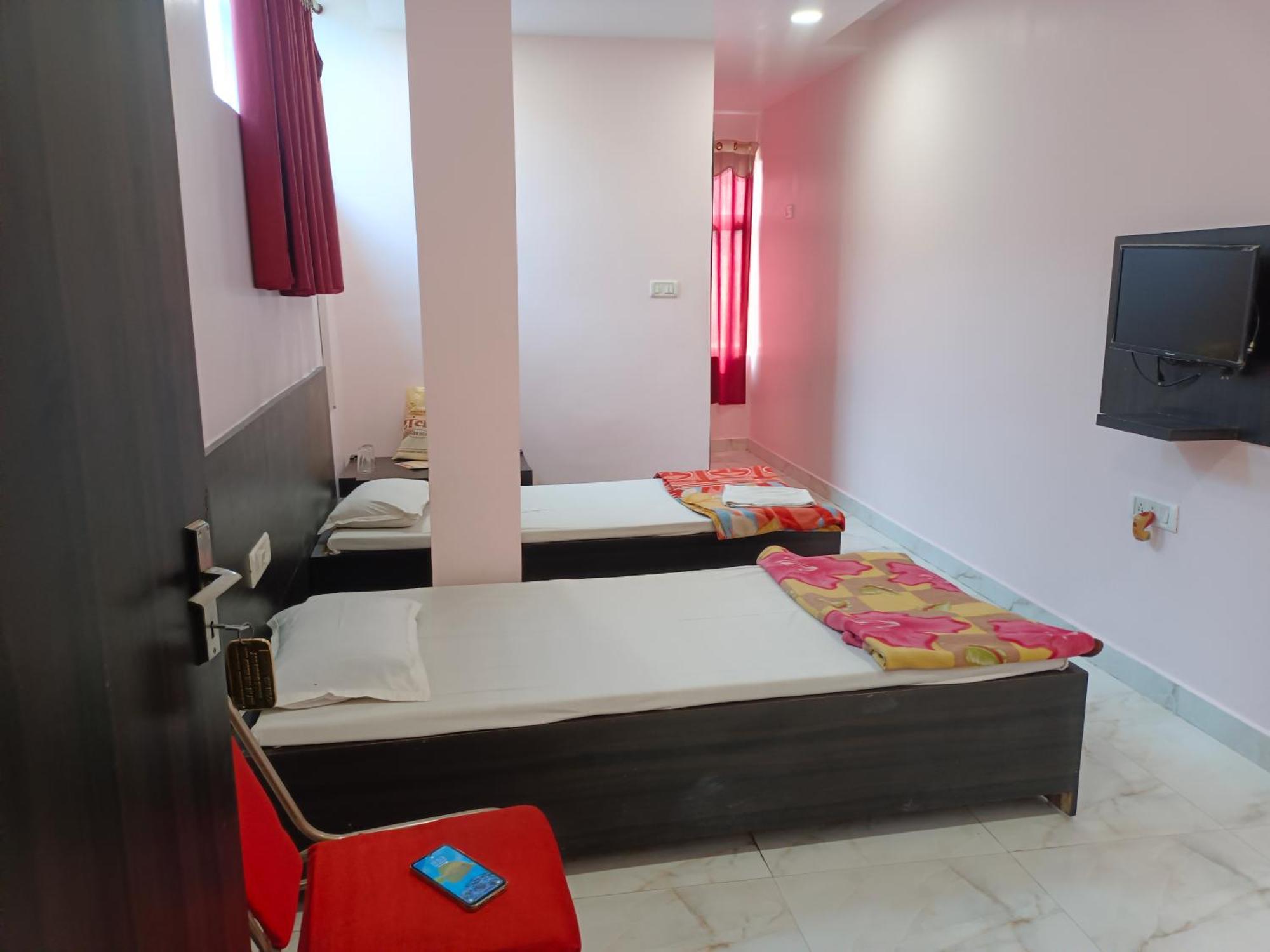 Hotel Sunaina International Gaya Pokoj fotografie