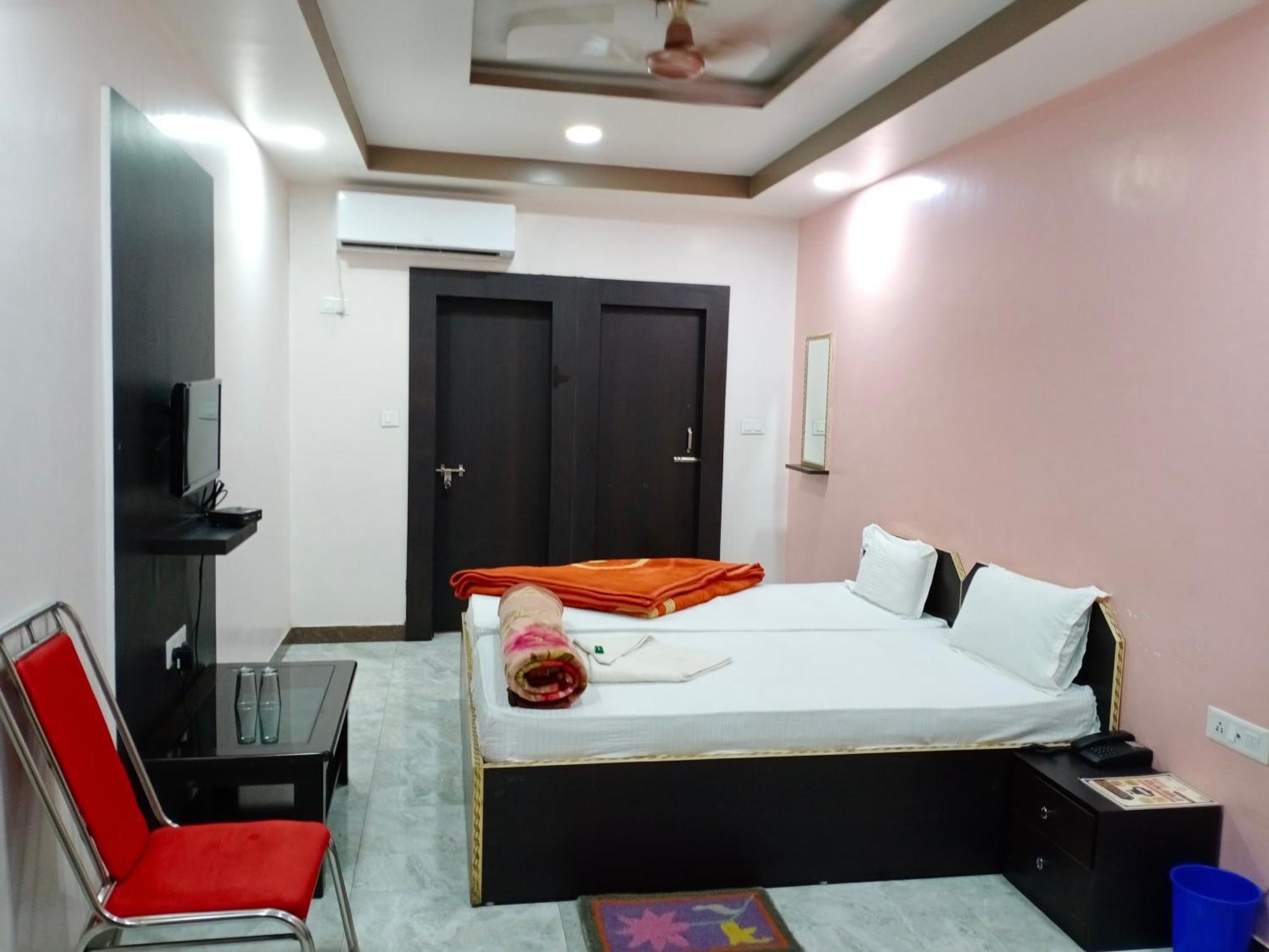 Hotel Sunaina International Gaya Pokoj fotografie